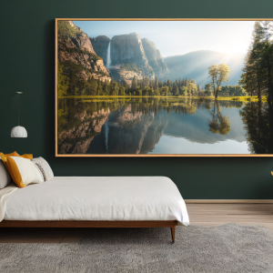 Photograph of a Yosemite summer with granite cliffs and trees reflected in a calm lake during summer.